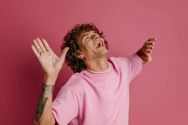 Happy Young Curly Hair Man Dancing Smiling Pink Background — Stock Photo, Image
