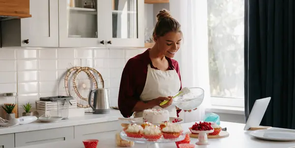 Smiling Female Pastry Chef Applying Whipped Cream While Making Cake — Stock Photo, Image