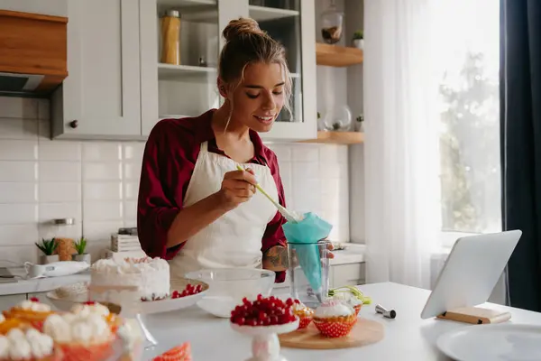 Smiling Young Female Pastry Chef Preparing Whipped Cream While Making — Stock Photo, Image
