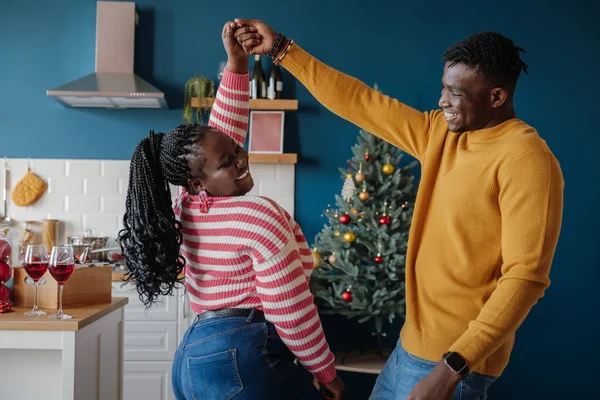 Happy Young African Couple Dancing Smiling While Celebrating Christmas Home — Stock Photo, Image