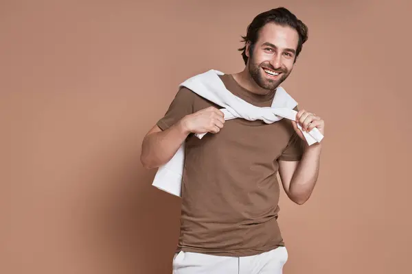 Fashionable Young Man Looking Camera Smiling Brown Background — Stock Photo, Image
