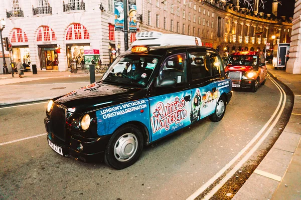 London November 2013 Black London Taxi Cab Traveling Night Stock Image
