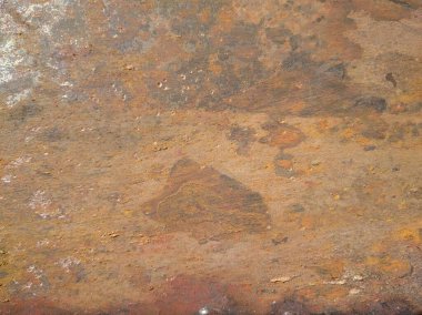 Boya, pas ve aşınma izleri taşıyan metal doku.
