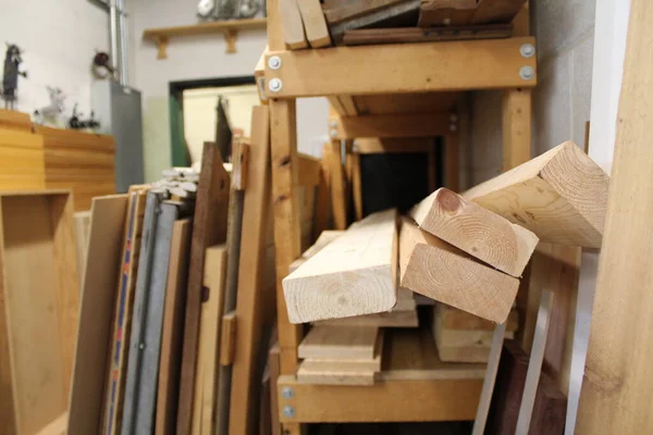 Pieces of Cut Wood Lumber on Shelf