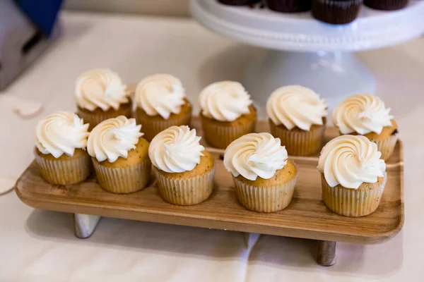 Vegan vanilla cupcakes at a wedding reception in Oregon indoors.