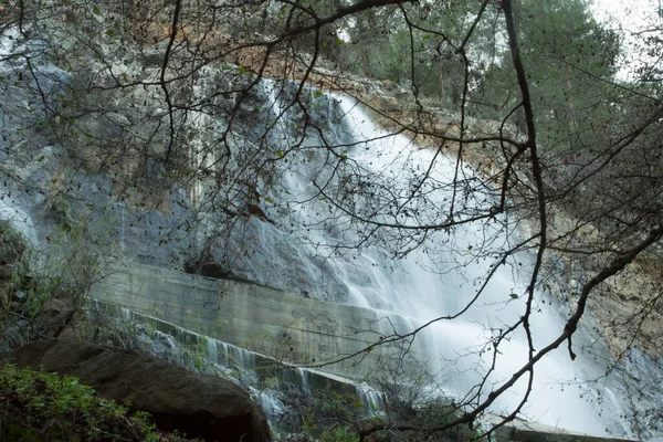 Waterfall on rocks at daytime 