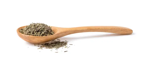 stock image Heap of dried Thyme in wood spoon isolated on white background