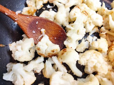 Cooking cauliflower the traditional way. Useful vegetarian diet food from vegetables.