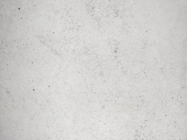 Açık gri desenli yüzeyin yüksek çözünürlüklü görüntüsü. Özgeçmiş, web sitesi tasarımı ya da ince, nötr bir estetik yaratmak için mükemmel. Benekli desen görsel ilgi uyandırıyor..