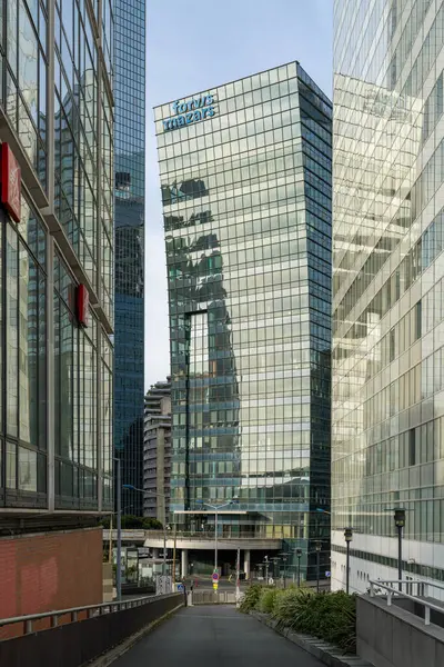 stock image Paris, France - August 4, 2024: Tour Exaltis viewed from the ramp by Coeur Defense in La Defense business district