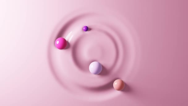 四个球在柔软的表面上呈圆形滚动 与液体材料接触的球体的顶部视图 3D渲染 — 图库视频影像