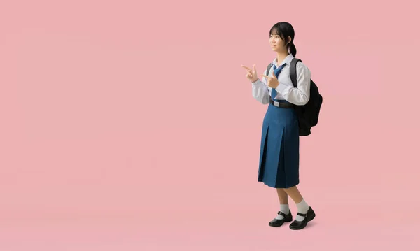 Full Body Asian Student Girl Wearing Uniform Smiling Pointing Finger — Stock Photo, Image