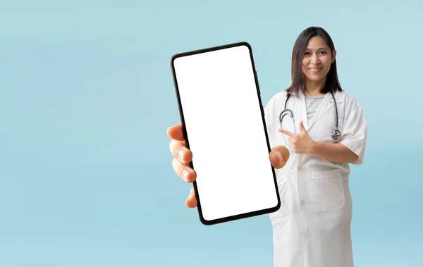 Smiling Asian Female Doctor Coat Hand Holding Big Smart Phone —  Fotos de Stock