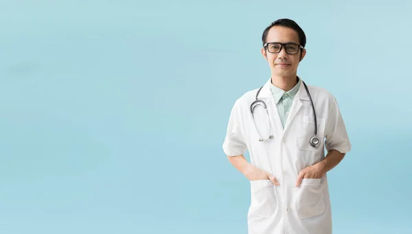 Asian Man Doctor Posing Smiling Isolated Blue Background Clipping Paths —  Fotos de Stock