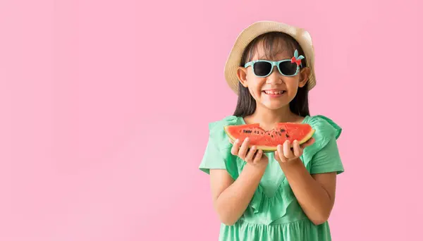 Happy Asian Little Girl Posing Wear Hat Sunglasses Holding Armelon Лицензионные Стоковые Изображения