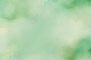 Abstract green pastel watercolor stains background on watercolor paper textured for design templates invitation card