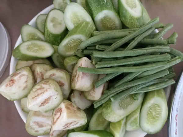 stock image Lalapan or fresh raw vegetables basket. eaten with chili sauce as a complementary food. authentic indonesian food