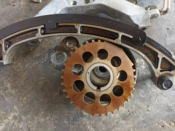 stock image Car timing set chain gear. Part of a car engine being repaired