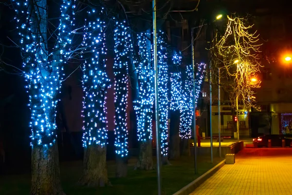 Christmas street light, city street at night