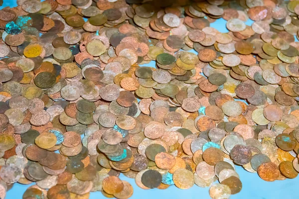 stock image many old coins on the table