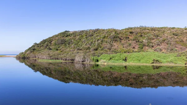Tropical Beach River Lagoon Mirror Smooth Water Reflecting Headland Trees — Stockfoto