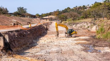 Industrial Road Highways Expansion foundations securing river canal earthwork on going projects landscape. clipart