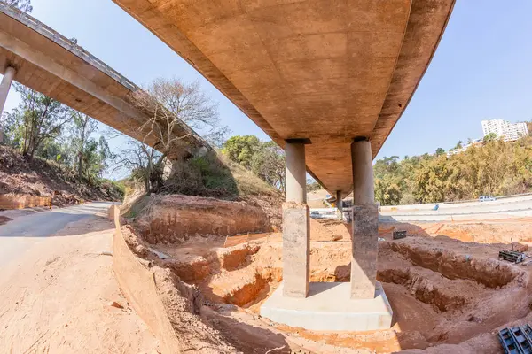 stock image Industrial Road Highways Expansion of bridge ramp flyovers strengthening concrete base column foundations earthwork on going projects construction landscape.