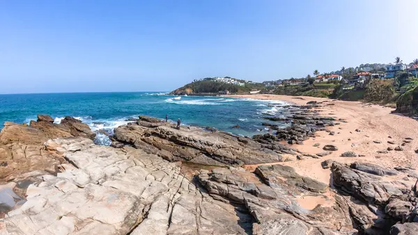 stock image Scenic view overlooking photograph of Thompsons Bay beach rocky coastline with blue sea water, a holiday destination.