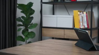 Asian little girl constructing and coding robot at STEM class. Fixing and repair mechanic toy car