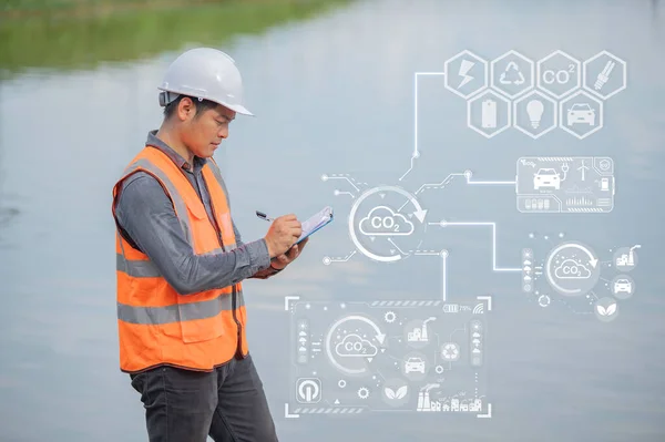 stock image Environmental engineers inspect water quality,Bring water to the lab for testing,Check the mineral content in water and soil,Check for contaminants in water sources,Clean energy