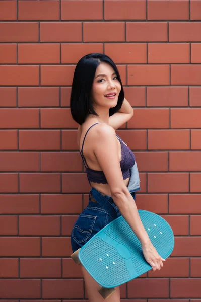 Portrait Hipster Girl Skateboard Brick Wall Background Beautiful Asian Woman — Fotografia de Stock