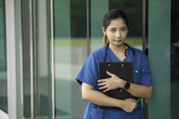 Young asian nurse working in clinic,Portrait of doctor in a hospital
