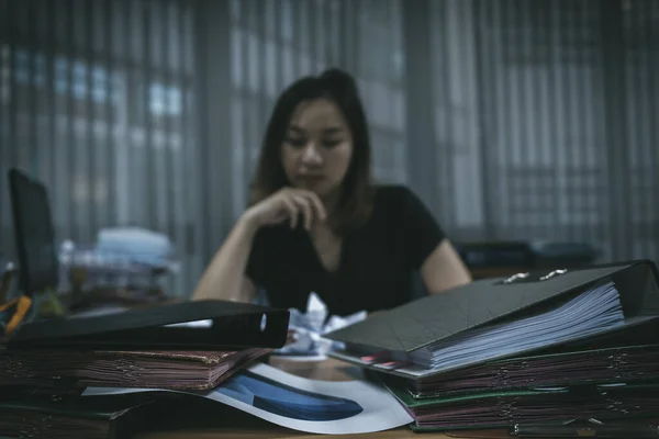 Asian office woman stress from work overload,She stressed because must send work At the specified time,Thailand people,Young secretary tired from boss about new project