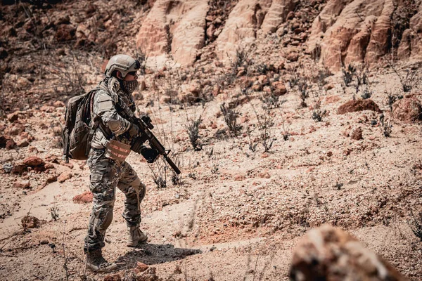 stock image Soldiers of special forces on wars at the desert,Thailand people,Army soldier Patrolled the front line,Calling up reinforcements