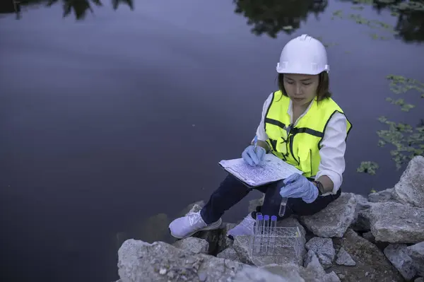 Environmental engineer inspect water quality. Bring water to the lab for testing. Check the mineral content in water and soil. Check for contaminants in water sources.