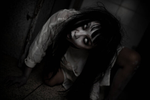 Portrait of asian woman make up ghost. Scary horror scene for background. Halloween festival concept. Ghost movies poster, angry spirit in the apartment