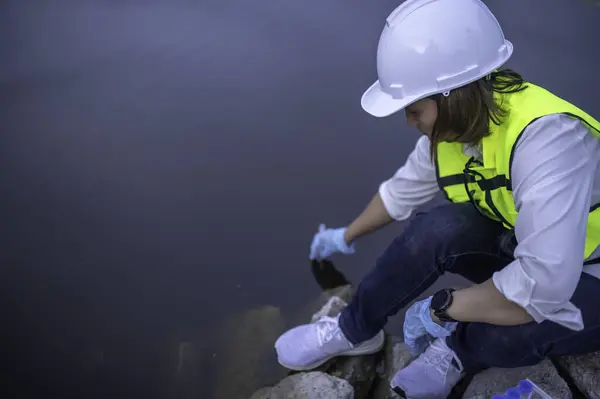 Environmental engineer inspect water quality. Bring water to the lab for testing. Check the mineral content in water and soil. Check for contaminants in water sources.