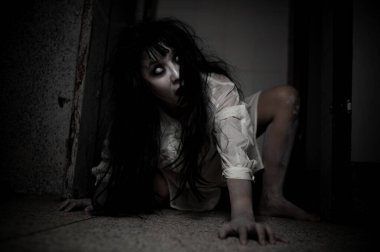 Portrait of asian woman make up ghost,Scary horror scene for background,Halloween festival concept,Ghost movies poster,angry spirit in the apartment clipart