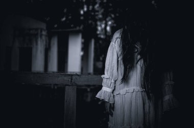 The Vengeful Spirit of a Young Girl Haunts an Abandoned House, A Chilling Scene of Horror and Supernatural Terror in an Eerie Thriller,Halloween festival concept clipart