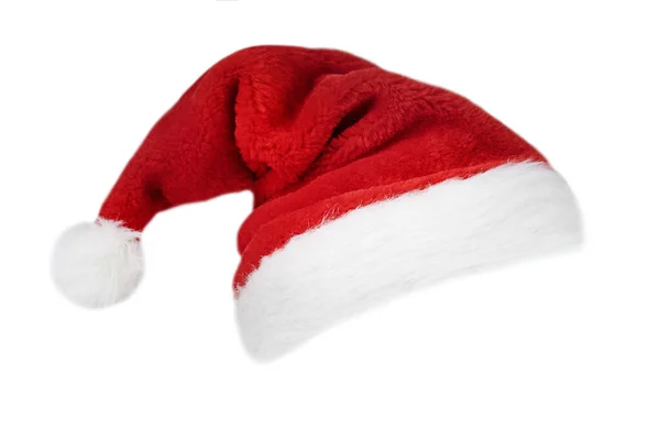 サンタクロースの帽子は白で隔離されています クリスマスの装飾 オブジェクトをカットします 伝統的な新年のシンボル — ストック写真