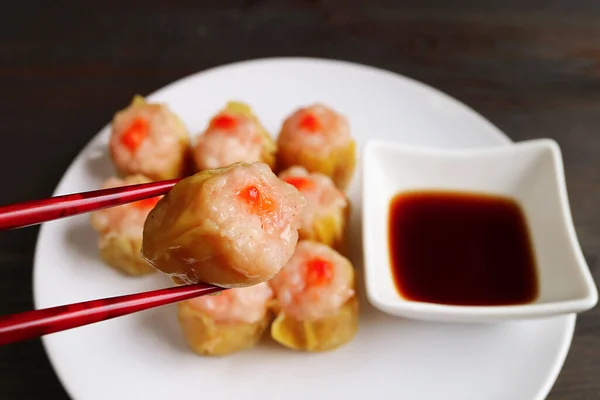 Closeup Shrimp Pork Filled Chinese Steamed Dumpling Being Picked Chopsticks — Stock Photo, Image