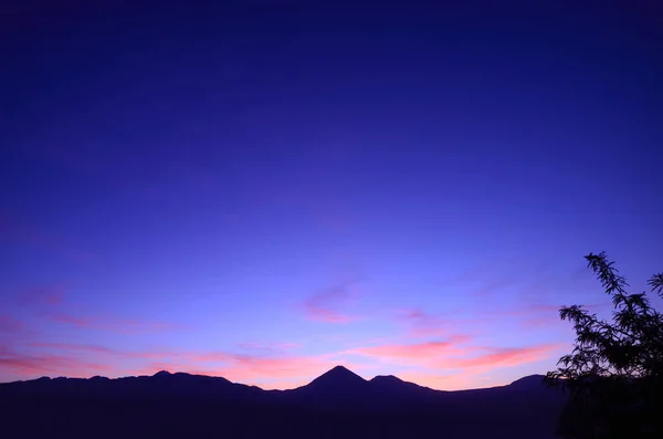 stock image Amazing twilight sky over the silhouette of mountain range in Atacama desert, northern Chile, South America