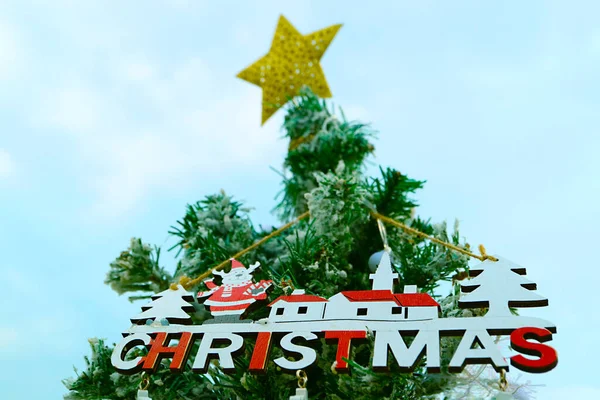 Stock image Beautiful Christmas Tree against Light Blue Sky