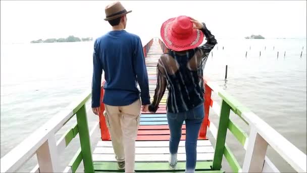 Footage Happy Couple Taking Walk Colorful Pier — Stock Video