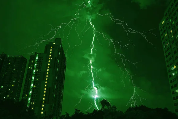stock image Surreal Pop Art of Incredible Lightning Strikes in Emerald Green Urban Night Sky