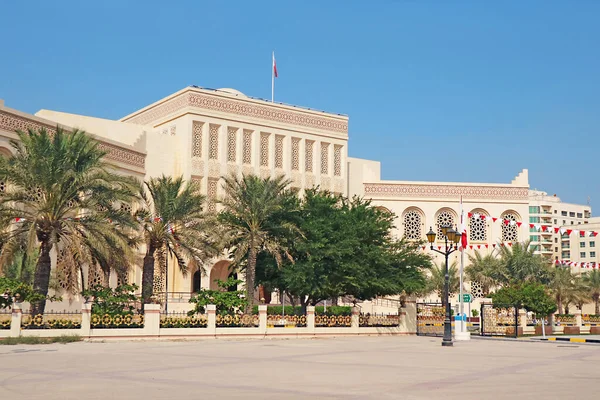 Impressive Arabian Style Building of Isa Cultural Centre with Row of Palm Trees, Manama, Bahrain