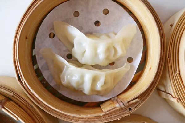 Crescent Shaped Jiaozi, Chinese Style Dumplings Stuffed with Ground Meat and Vegetables
