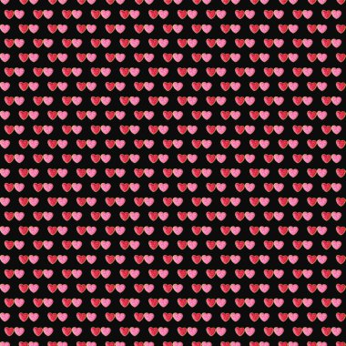 Kusursuz bir çift kırmızı ve pembe kalp deseni. Siyah zeminde kraliyet kremalı kurabiyeler.