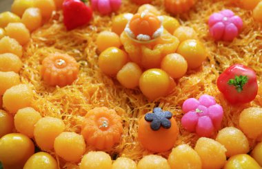 Closeup of Assorted Auspicious Thai Traditional Desserts Made from Sweetened Egg Yolks clipart