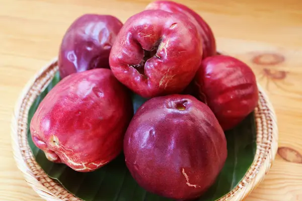 stock image Pile of fresh ripe deep red Malay apples called Chompu Mameaw in Thailand